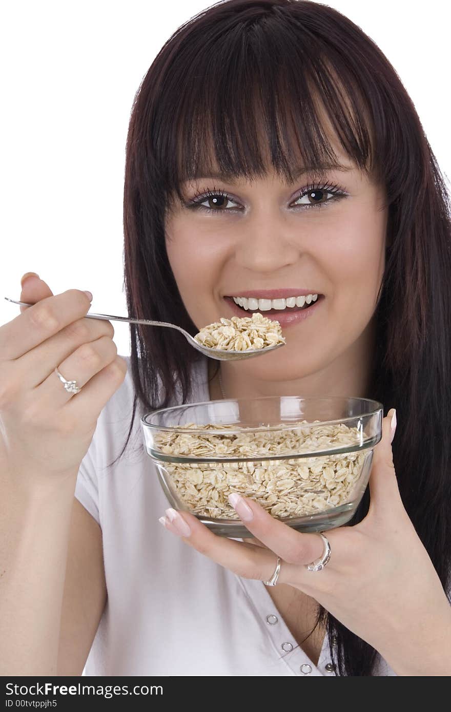 Woman eats cereals