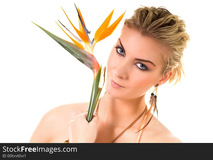 Beautiful woman with bird of paradise floser isolated on white background