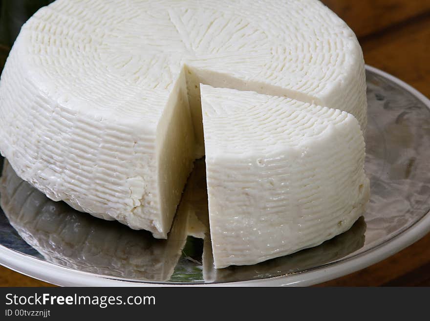 Salty hard cheese, Greek style, on a table