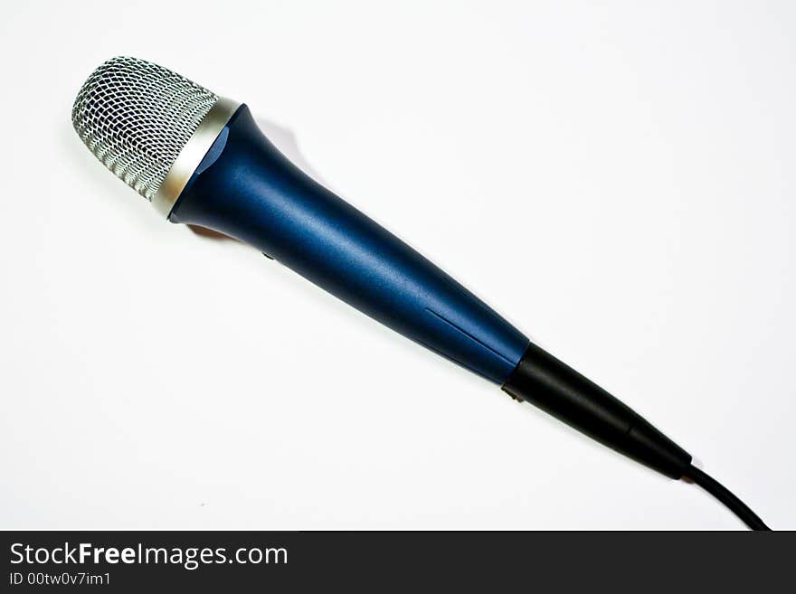 Blue mic over the white background. Blue mic over the white background