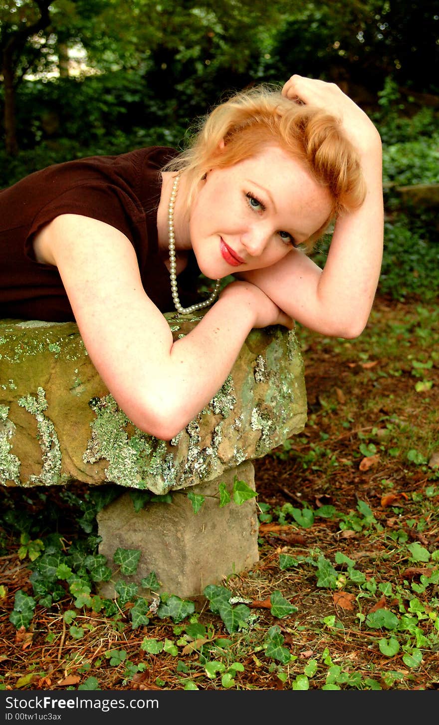 Young Woman Lying on bench