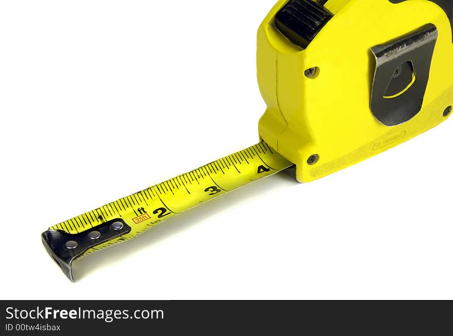 Yellow tape measure on a white background. Yellow tape measure on a white background.