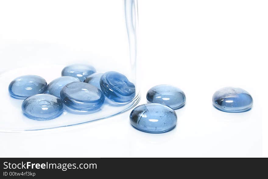 Blue glass stones with reflections and refractions. Blue glass stones with reflections and refractions