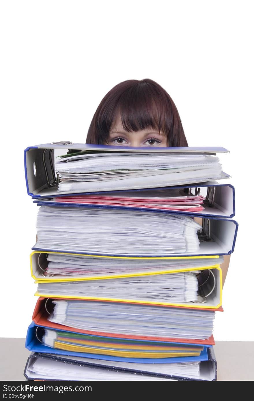 Woman hidden behind folders with documents. Woman hidden behind folders with documents