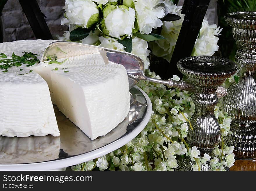 Salty hard cheese, Greek style, on a table