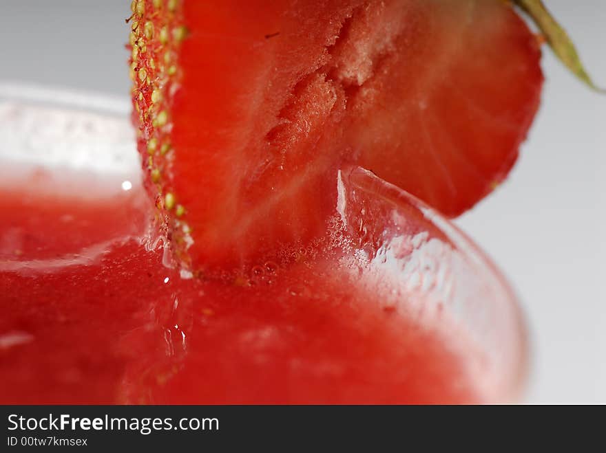 Detail of strawberry on glass