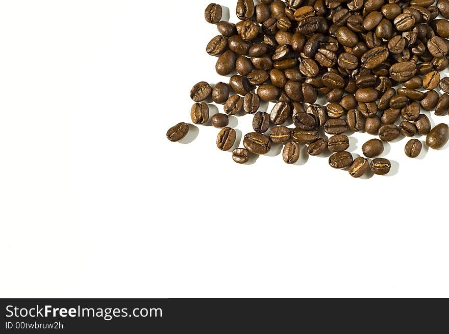 Coffee beans against white background. Coffee beans against white background