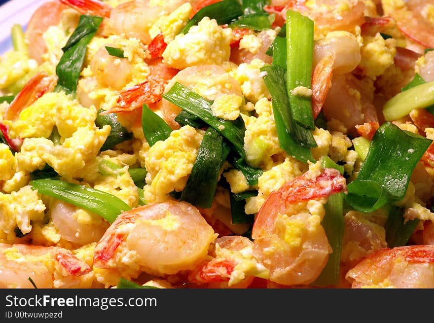 Chinese dish made with shrimp, egg and green onion