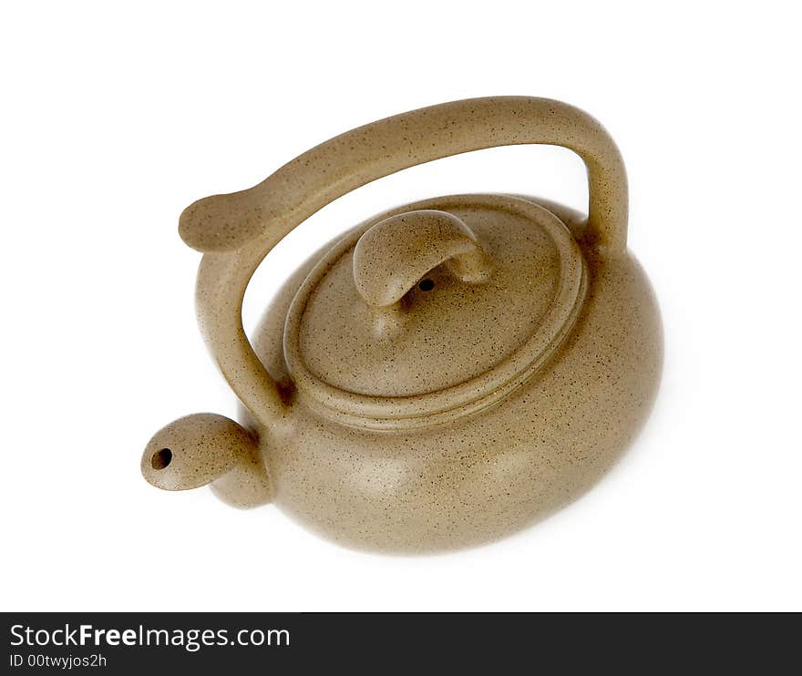 Clay teapot,also called zisha teapot in China,also it is a artwork. isolated on white background.