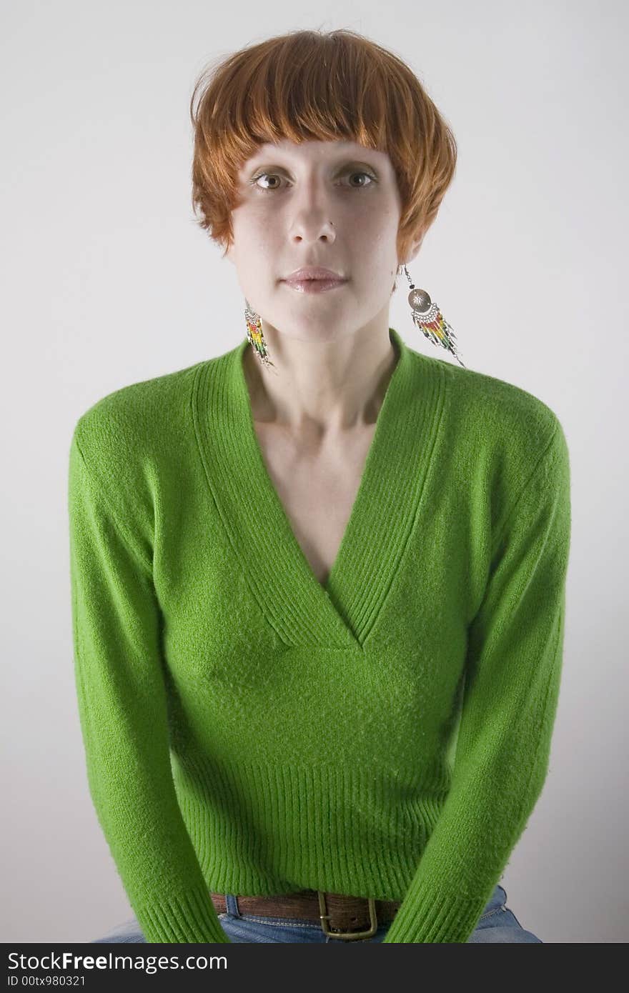 Portrait of young woman on chair. Portrait of young woman on chair