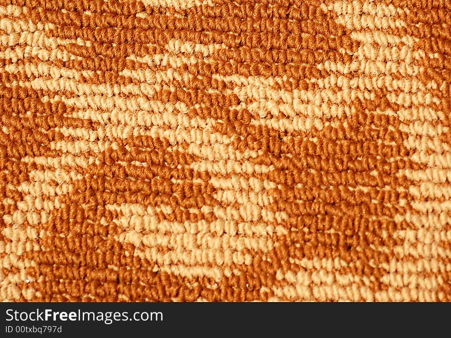 Brown and beige felt carpet.