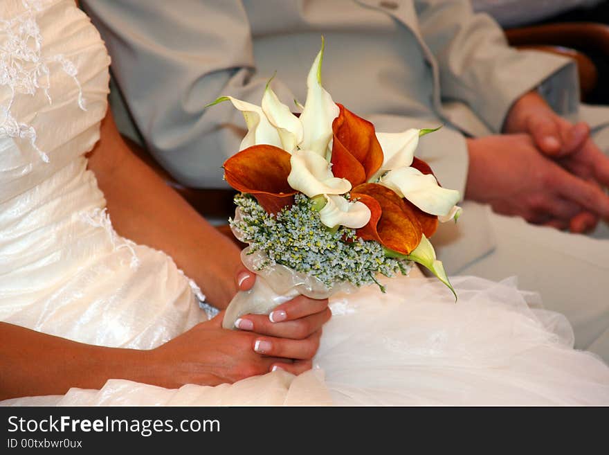 Beautiful bridal bouquet in the hand of the bride.