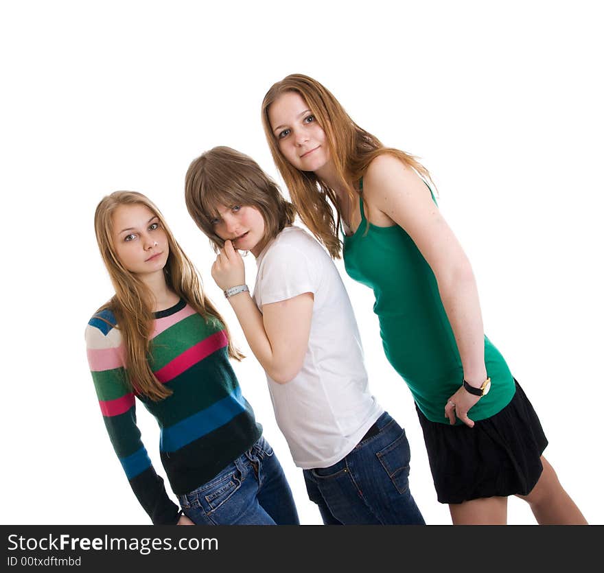 Three attractive girls isolated on a white