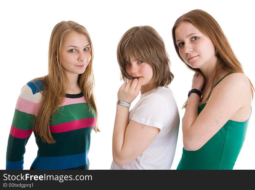 Three attractive girls isolated on a white