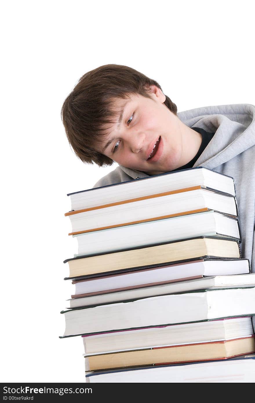 The young student with a pile of books isolated on a white background