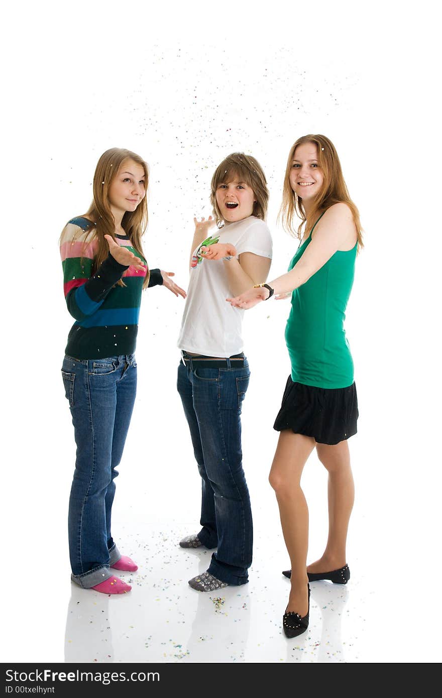 Group of girls with confetti isolated on a white background