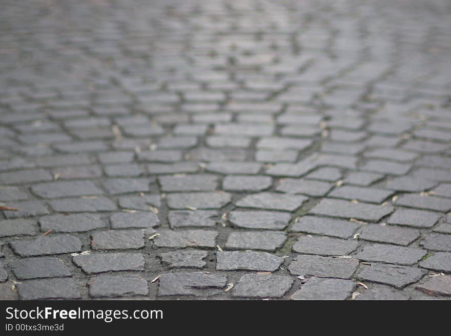 Cobblestone road details, perspective background. Cobblestone road details, perspective background