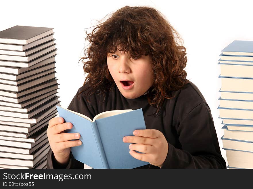 Boy surprised and many books on white background