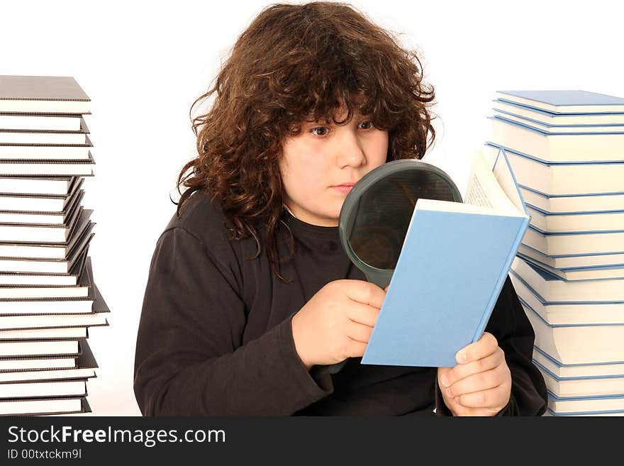 Boy reading a book with lens on white background