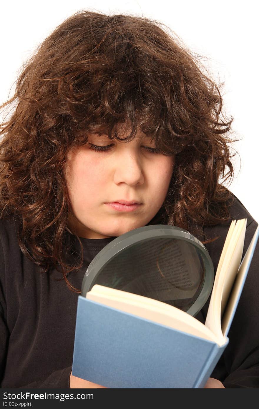 Boy reading a book with lens on white background