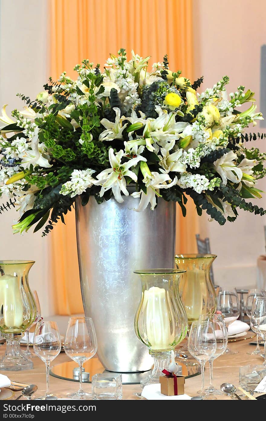 White flower  lily bottle glass table. White flower  lily bottle glass table