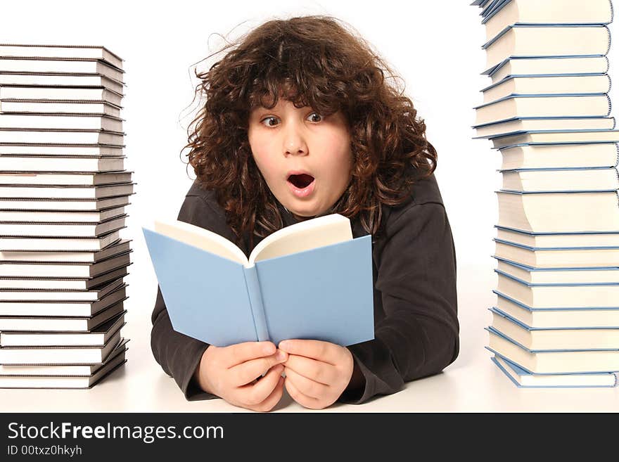 Boy surprised and many books on white background