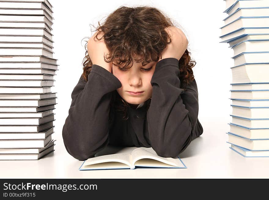 Boy reading a book and many books on white background