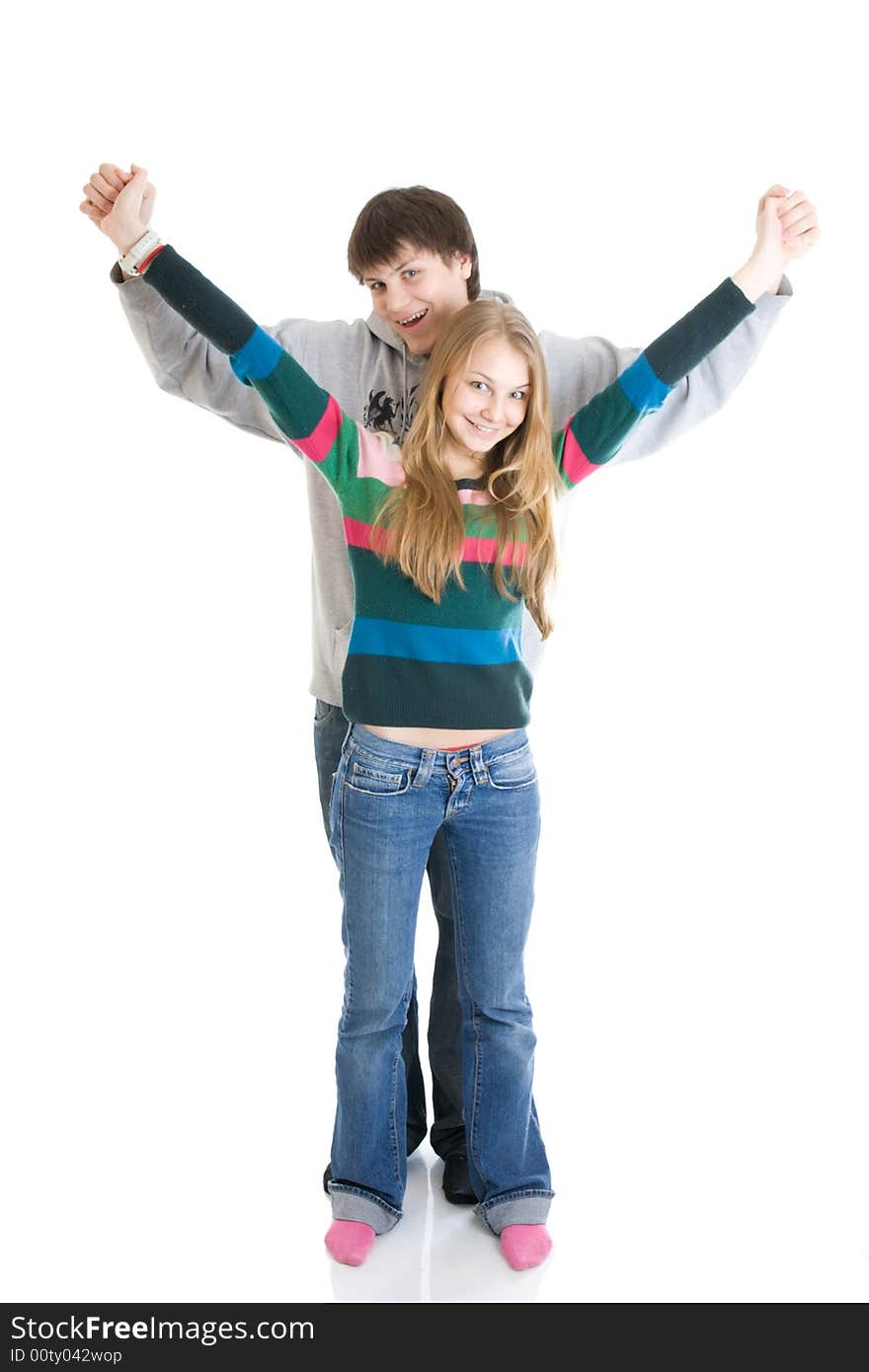 Young embracing pair isolated on a white