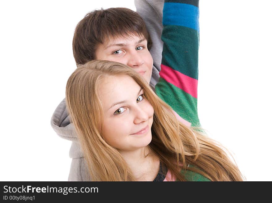 Young embracing pair isolated on a white