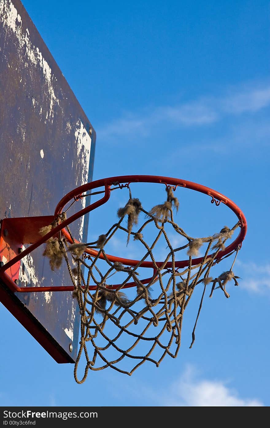 Single basketball construction with hoop and net outdoor macro