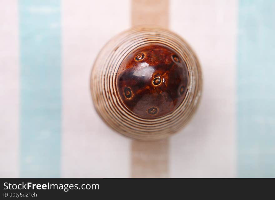 Easter decoration - striped egg on striped cloth