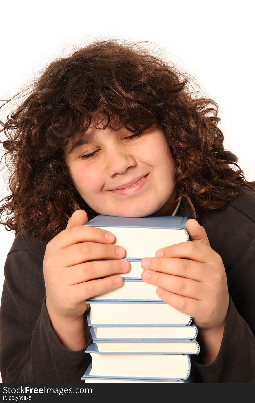 Happy boy and many books on white background