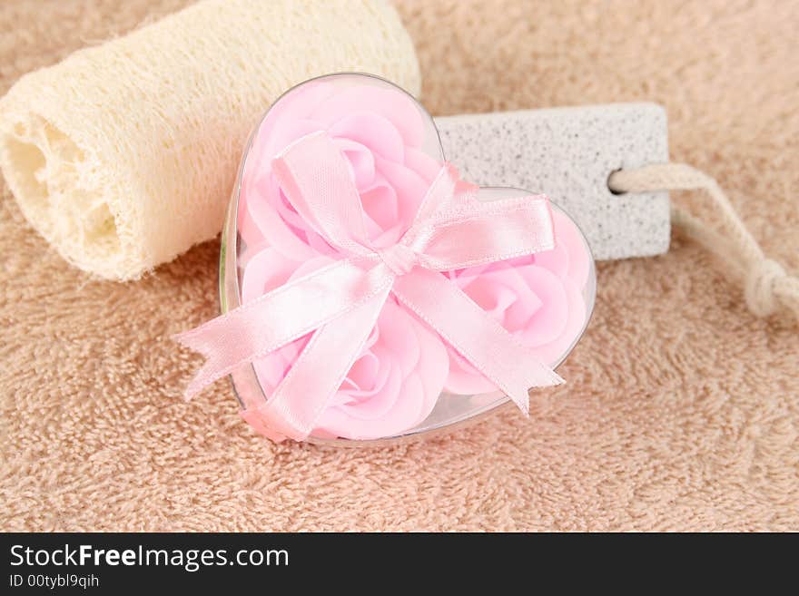 Pink Flower soaps in a heart shaped container. Pink Flower soaps in a heart shaped container