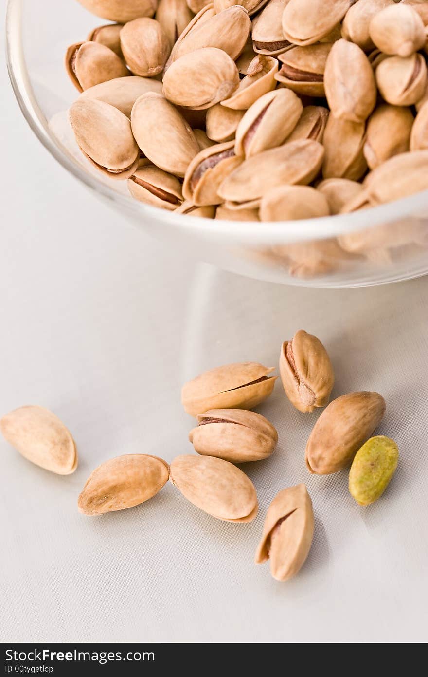 Food serias: macro picture of scattered pistachio nuts