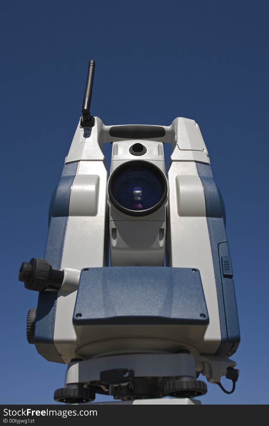 Theodolite with blue sky as a background.