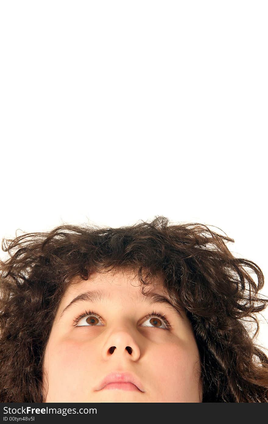 Boy looking up on white background