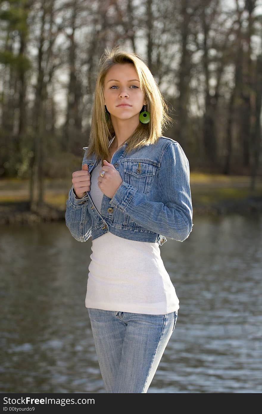 A beautifil smiling girl on natural background. A beautifil smiling girl on natural background