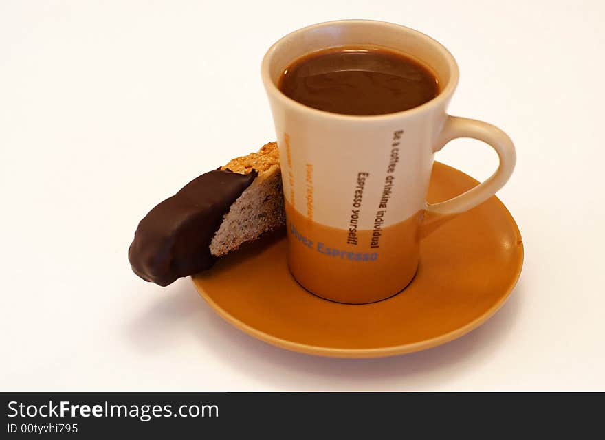 Time out for walnut biscotti dipped in a cup of espresso coffee. Time out for walnut biscotti dipped in a cup of espresso coffee.