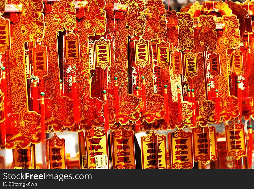 Lucky sign of Chinese new year in temple，People go to the temples for worshipping Buddha, wish oneself and the family be safety and happiness. Lucky sign of Chinese new year in temple，People go to the temples for worshipping Buddha, wish oneself and the family be safety and happiness.