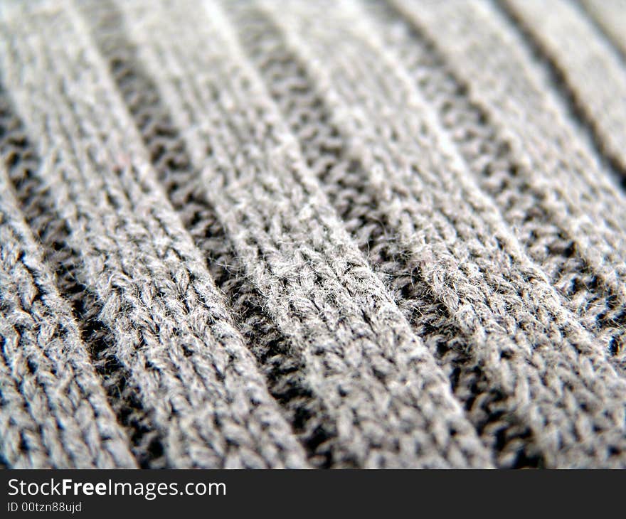 Close up of woven material of cotton sweater