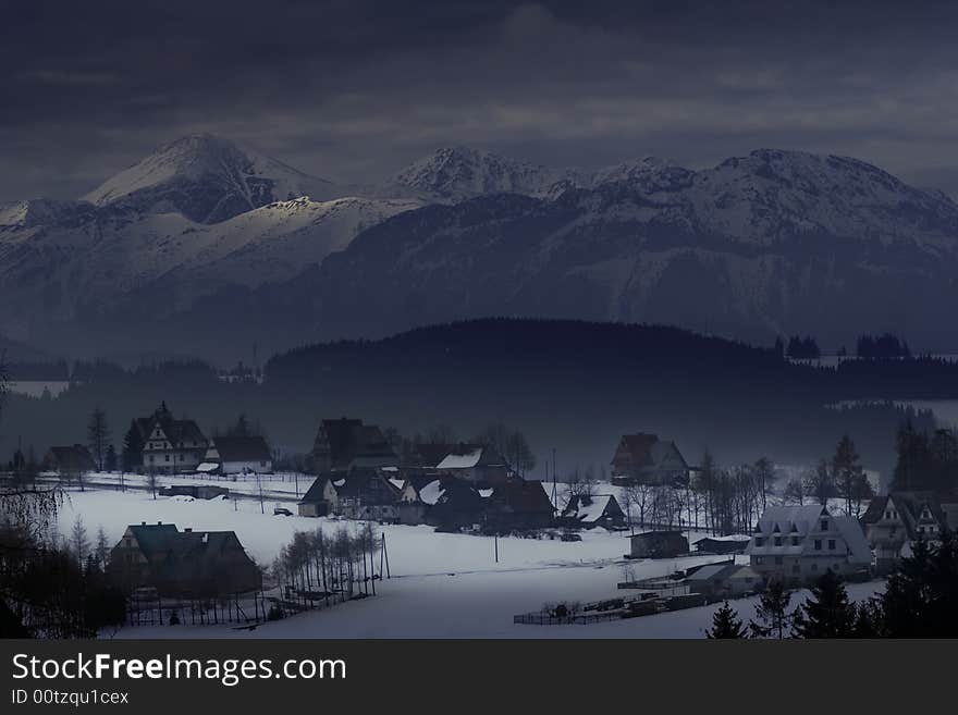 Houses at the foot of mountains