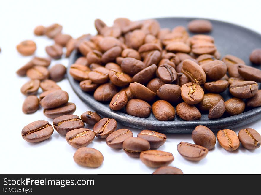 Coffee Beans On The Black Plat