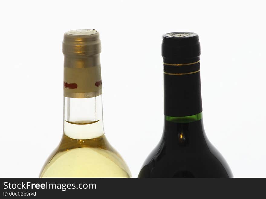 Two bottles of unopened white and red wine