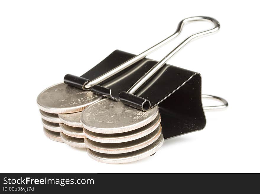 Coins clamped by a paper clip