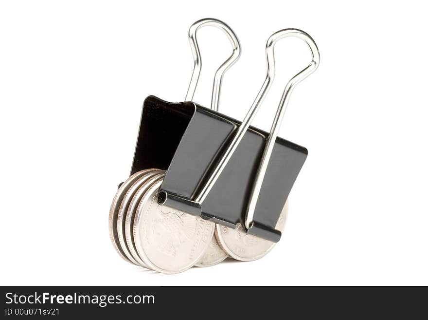 Coins clamped by a paper clip isolated on a white background. Clipping path included.