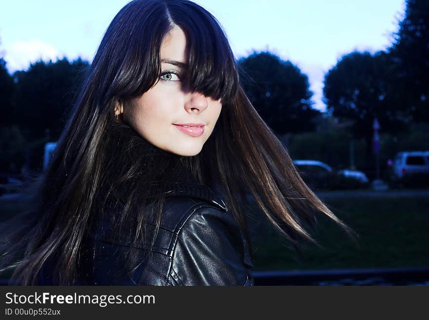 Pretty girl with long hairs in park. Pretty girl with long hairs in park