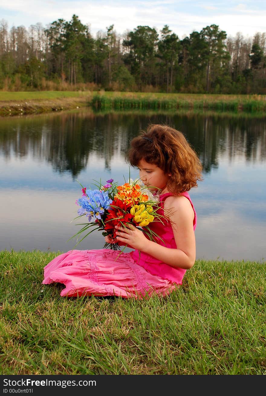 Cute Girl Holding Flowers