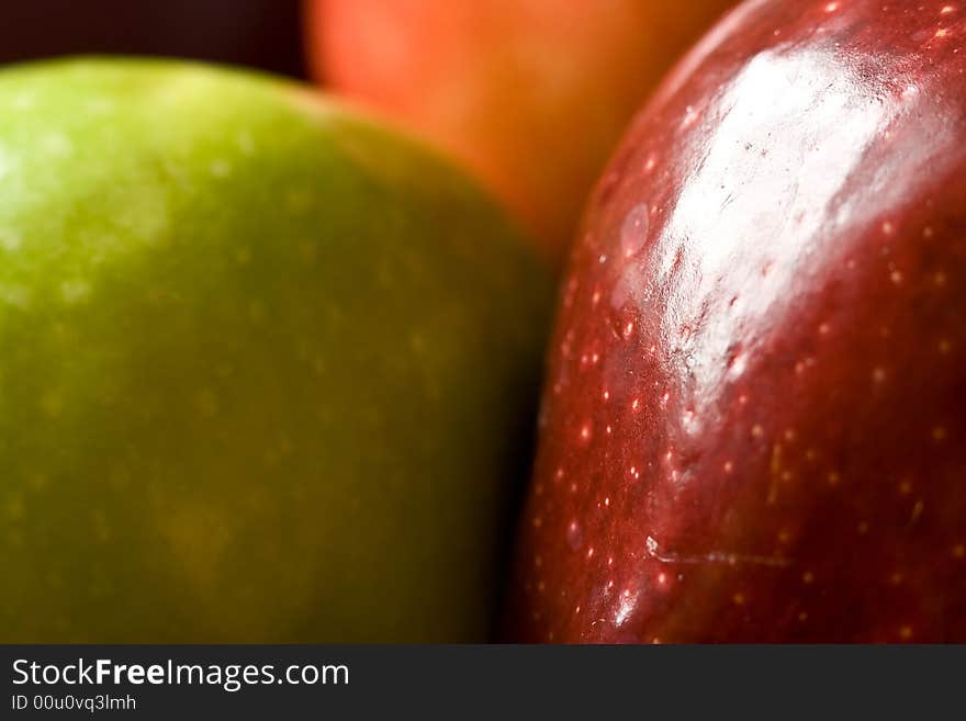 Macro shot of fresh ripe apples washed with water