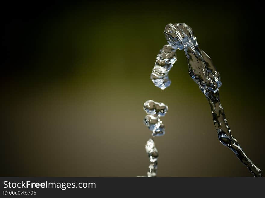 Water jet over isolated background