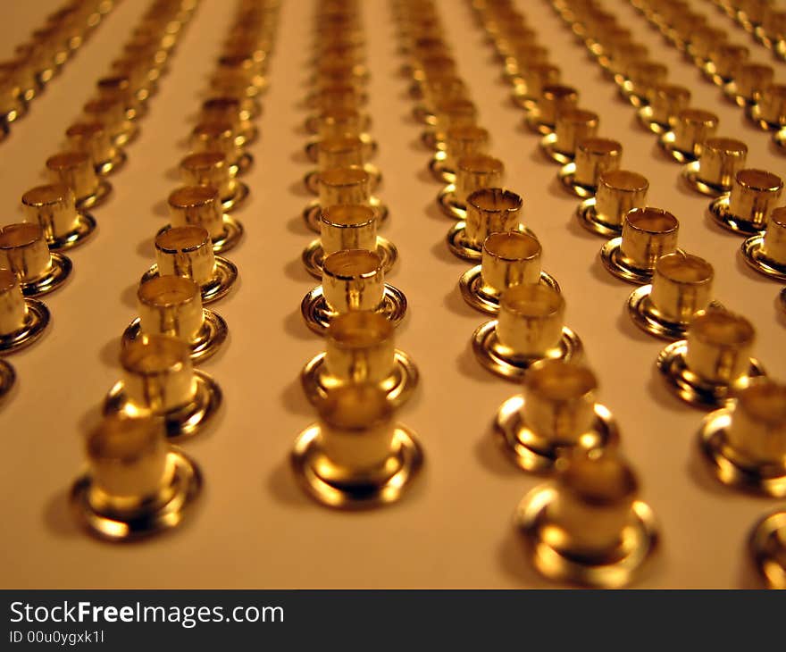 Group Of Gold Rivets.